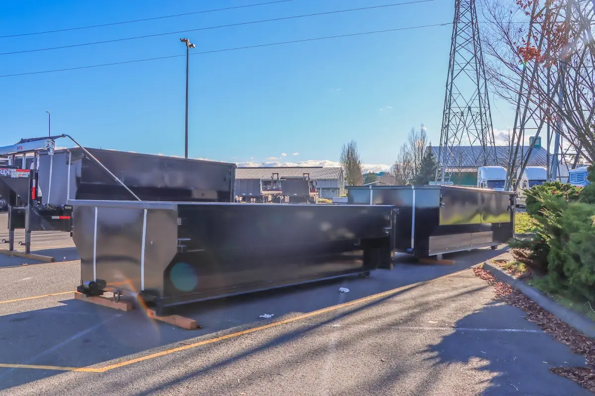 Roll-off dumpster ready for waste disposal at job site for 12 Yard Dumpster Rental in Maplewood